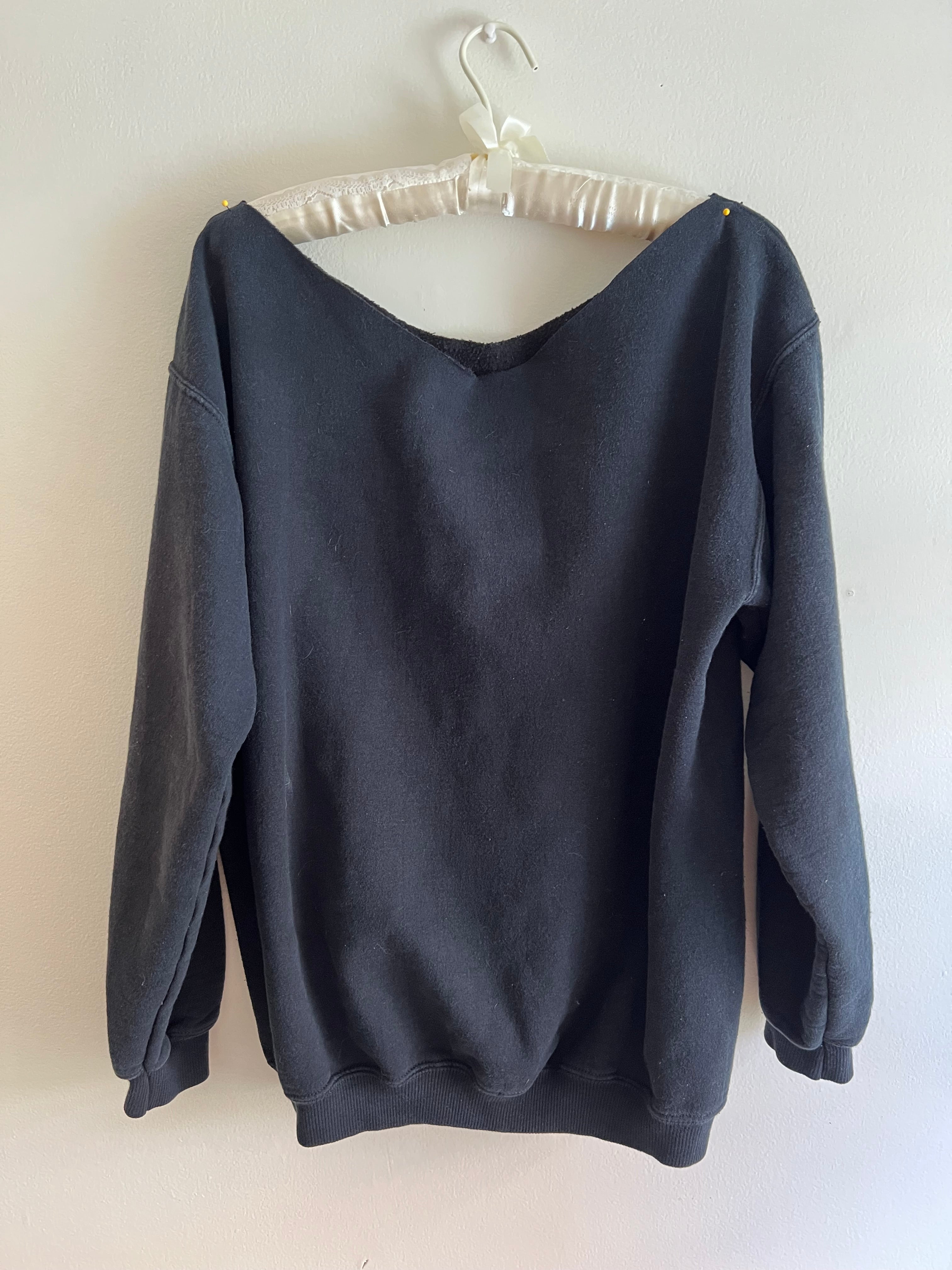 black off-the-shoulder crewneck