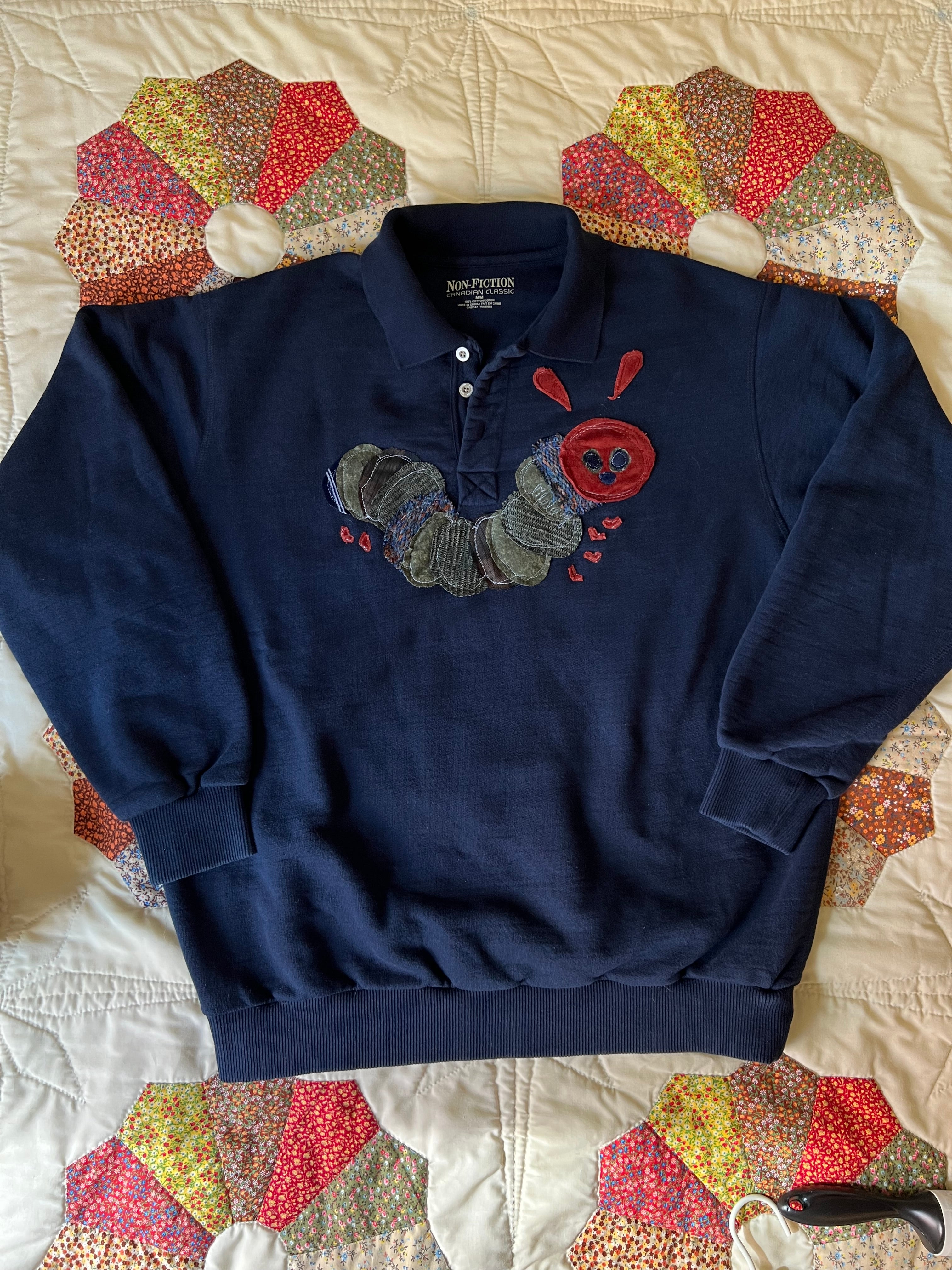 navy blue quarter-button up sweatshirt