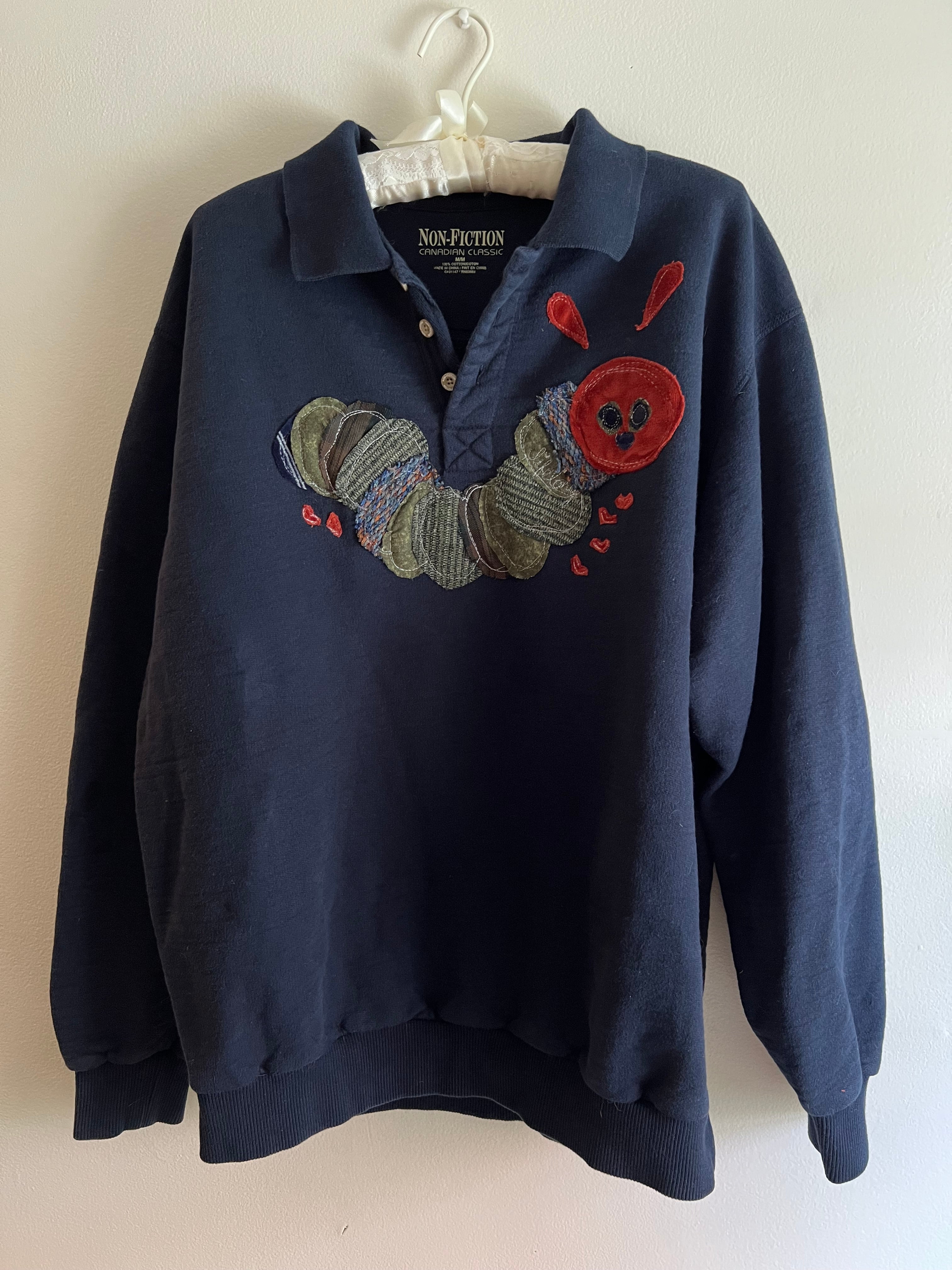 navy blue quarter-button up sweatshirt
