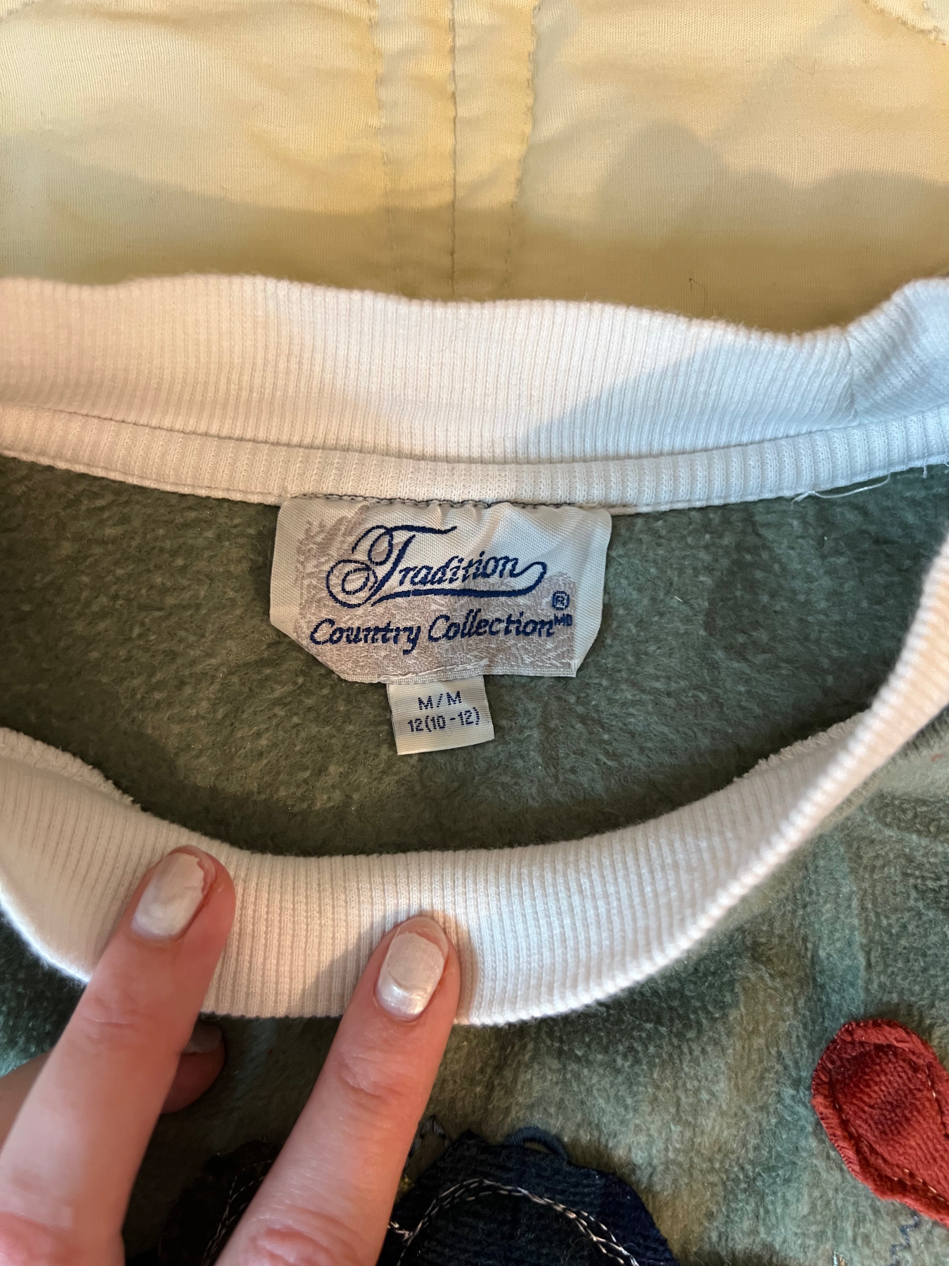 green fleece sweatshirt