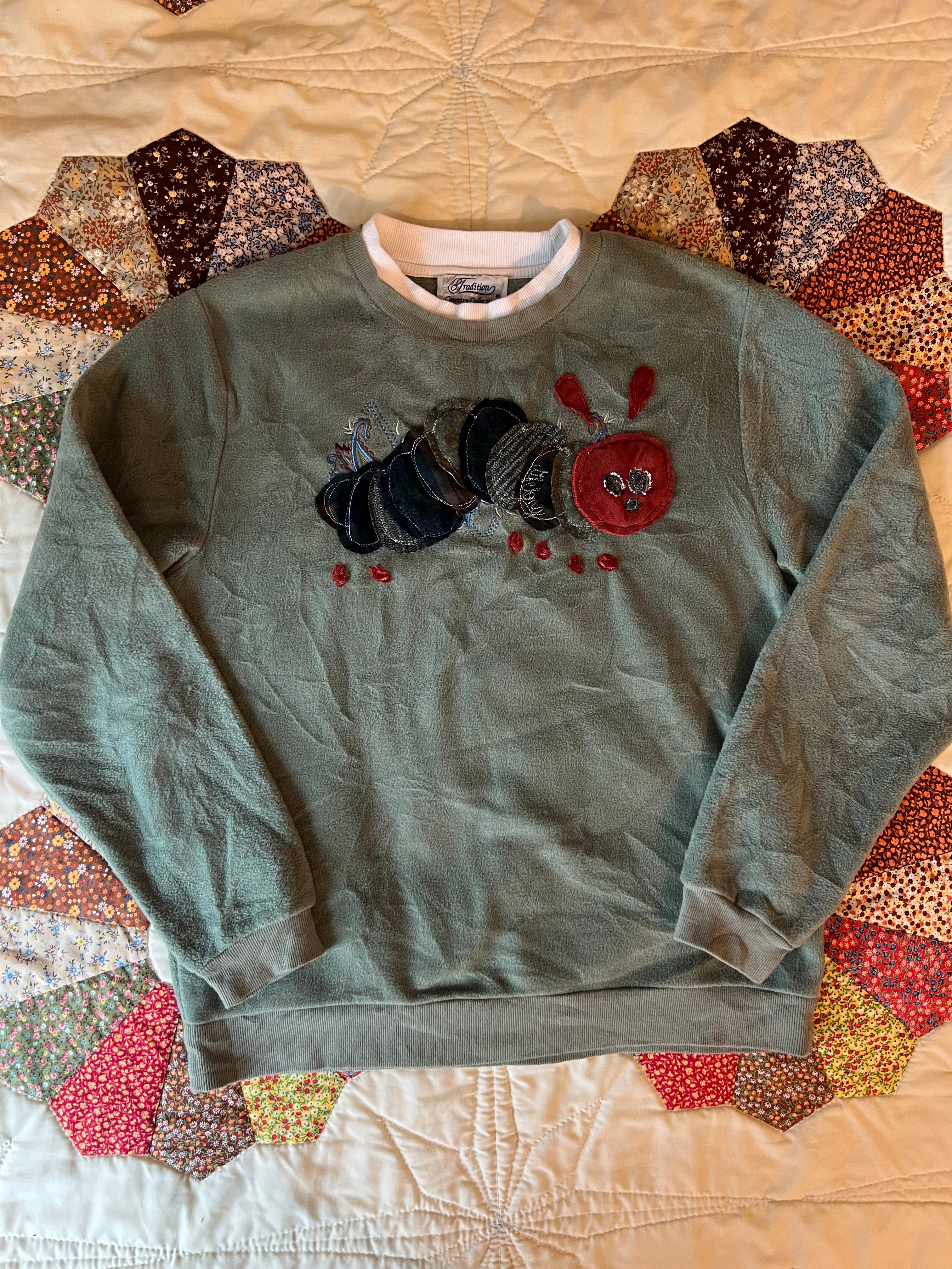 green fleece sweatshirt