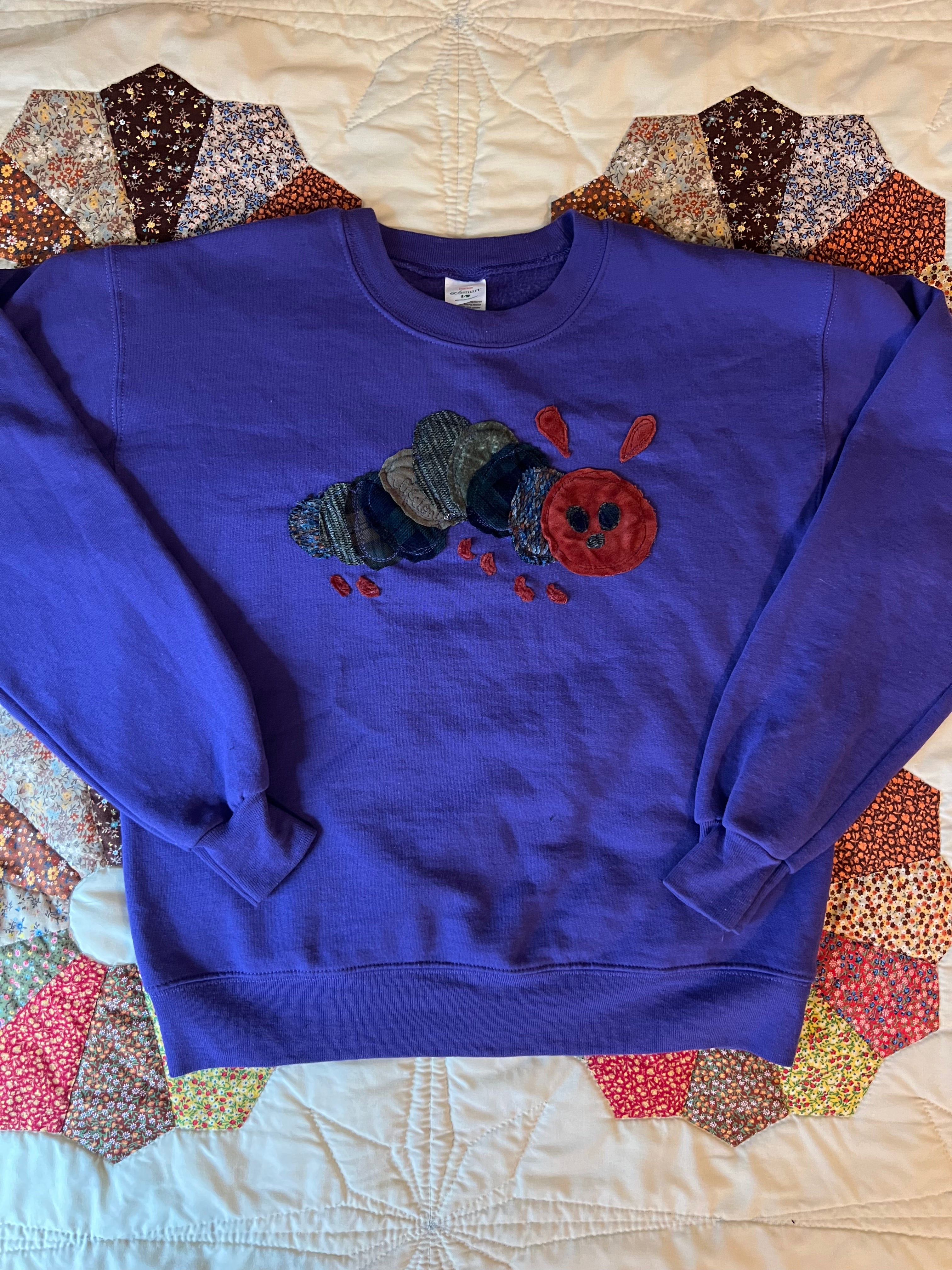 purple crewneck with butterfly