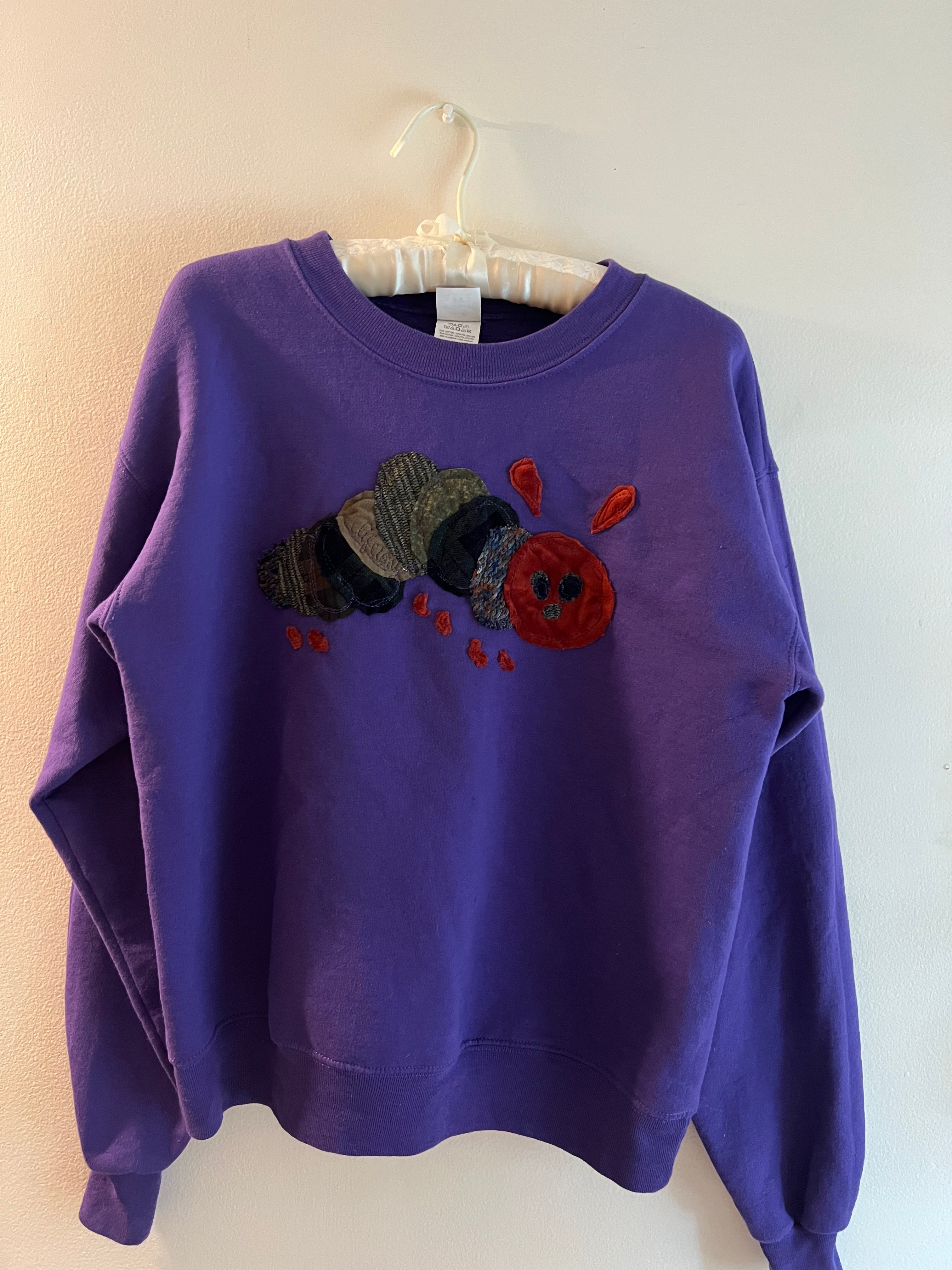 purple crewneck with butterfly